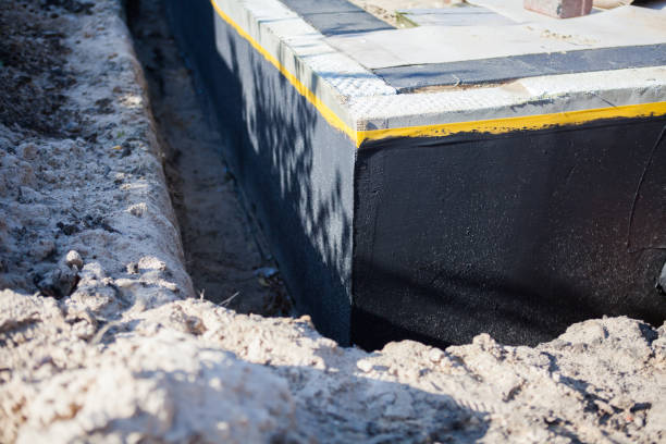 Professional Basement Waterproofing technician working in Gallatin, TN